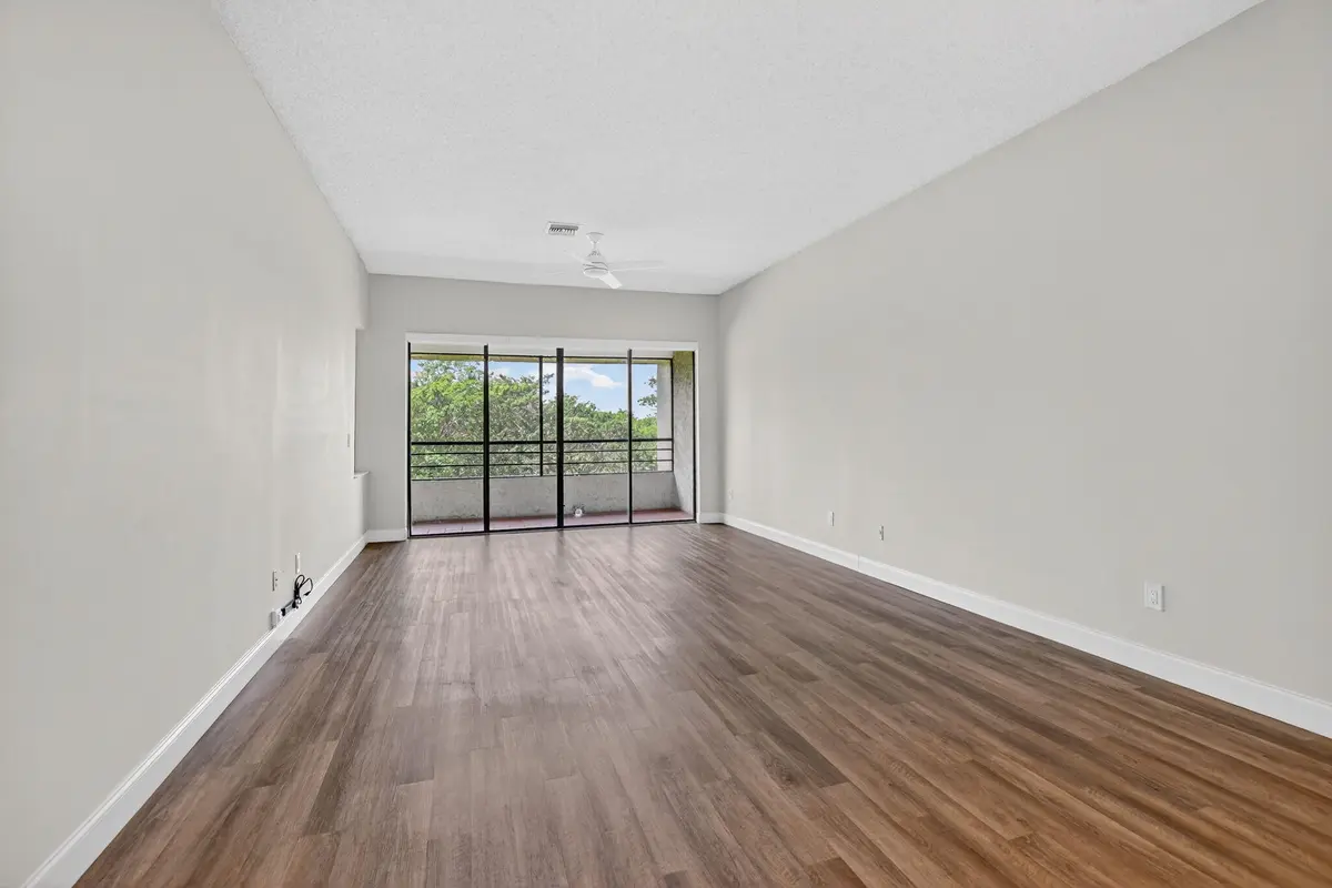 living room at 7472 La Paz Boulevard 304, Boca Raton