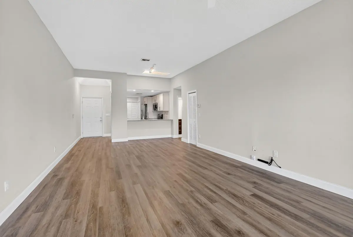 living room at 7472 La Paz Boulevard 304, Boca Raton
