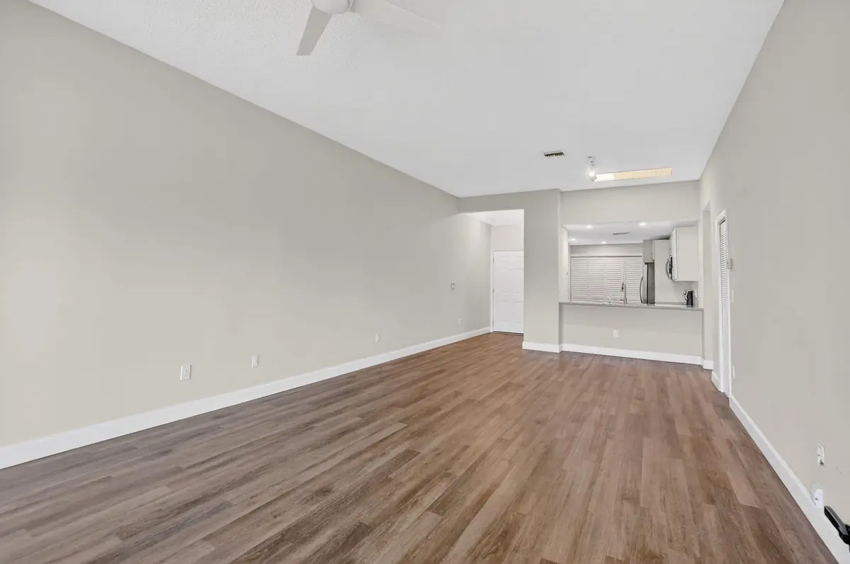 living room at 7472 La Paz Boulevard 304, Boca Raton