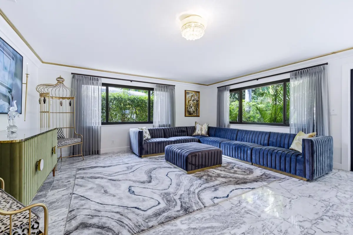 Livingroom Facing Windows at 702 S Atlantic Drive, Lantana
