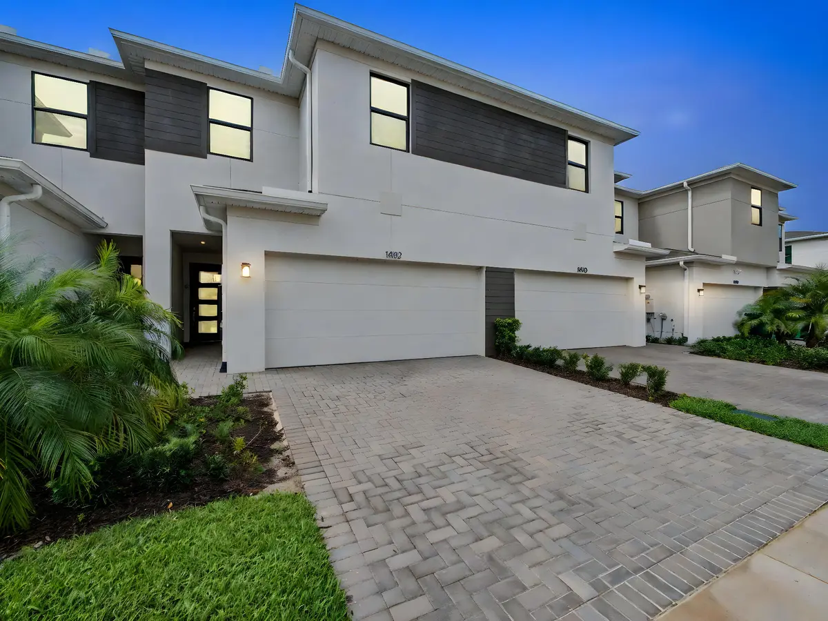 Front Exterior Night Shot at 14182 SW Solange Street, Port St. Lucie
