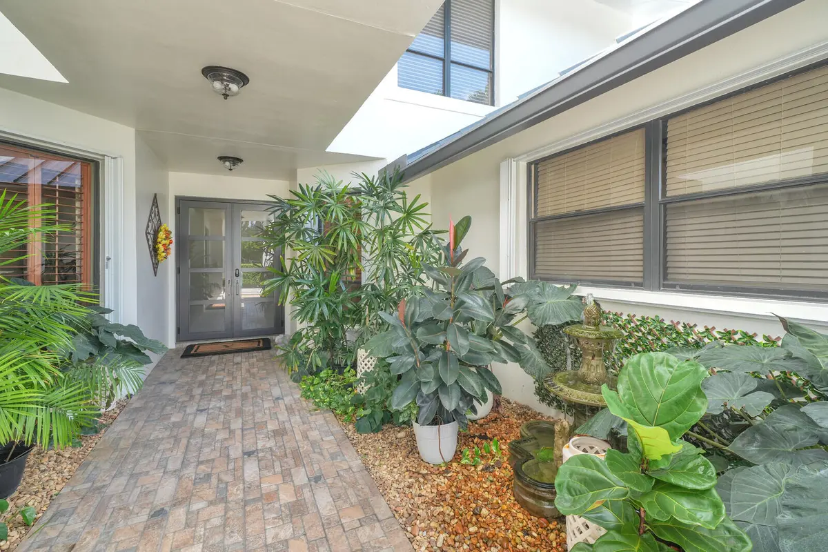 Lush entry with fountain courtyard at 181 Atlantis Boulevard C, Atlantis