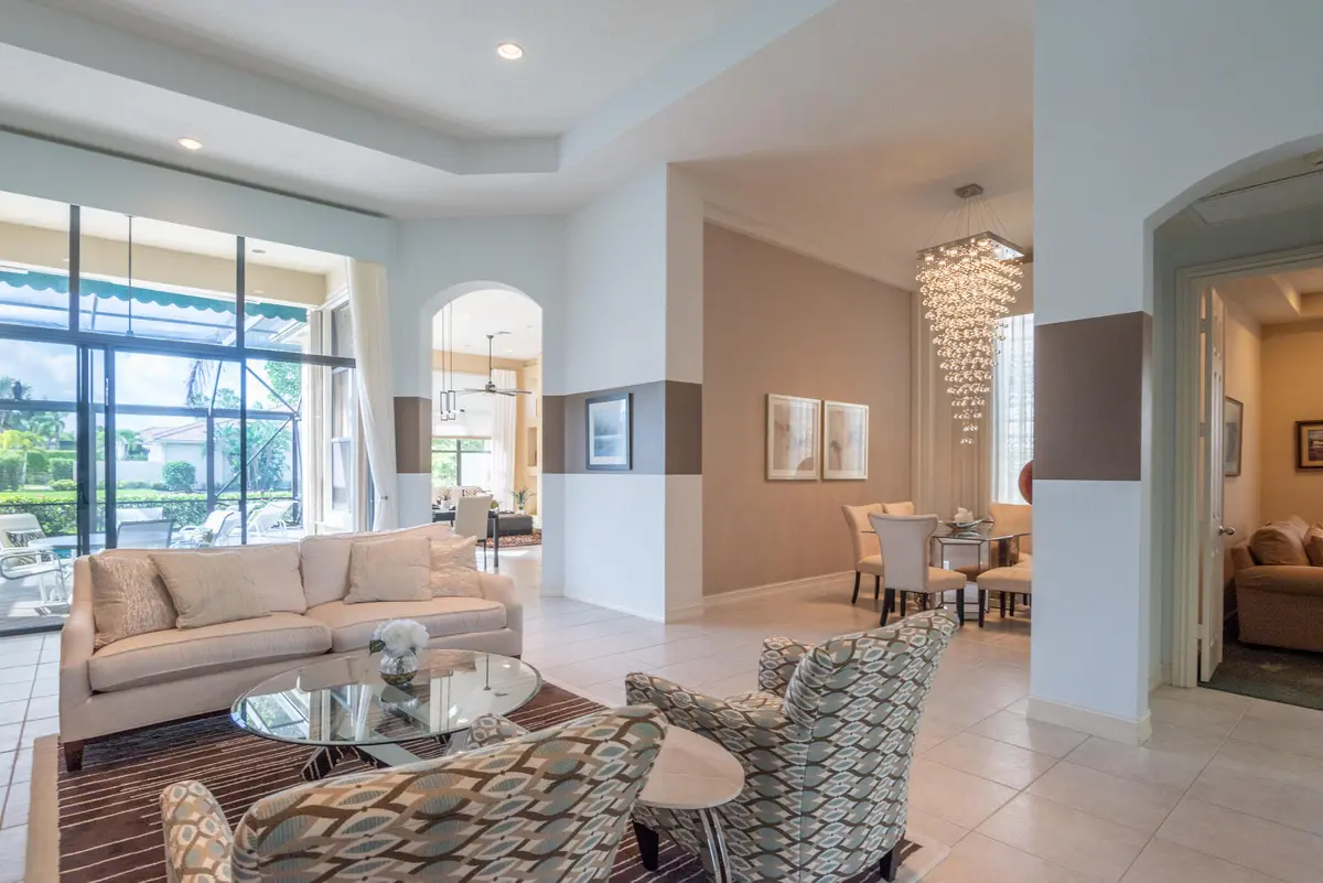 Living Room and Dining Room at 10240 Blue Heron Cove, West Palm Beach