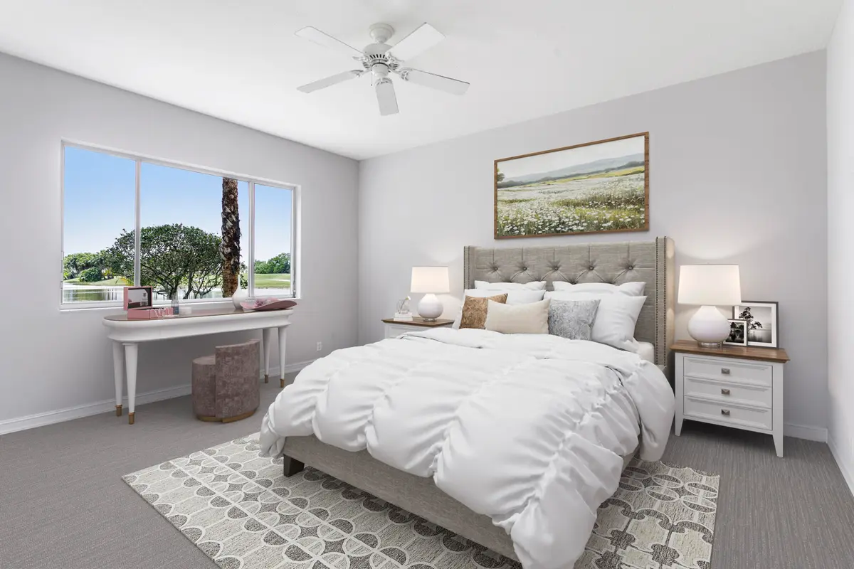 Virtually Staged Primary Bedroom at 7507 Orchid Hammock Drive 6a, West Palm Beach