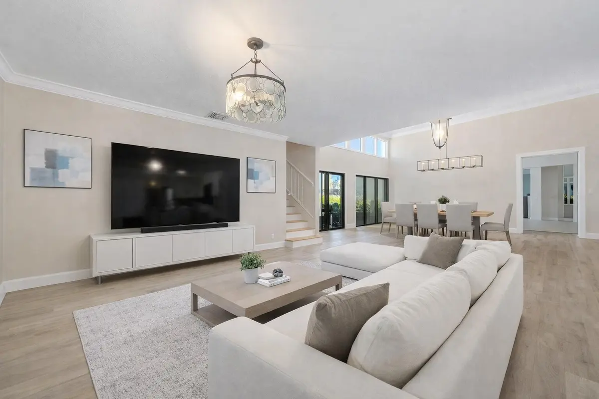 Staged Dining Room/ Living Room at 3000 Conifer Drive, Fort Pierce