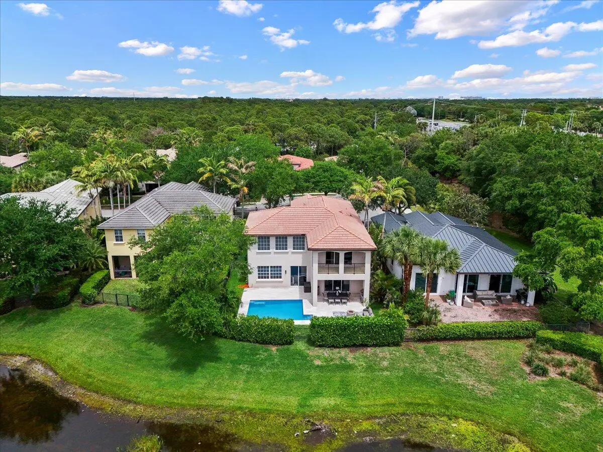 Pool Home + Lake Views at 2020 Graden Drive, Palm Beach Gardens