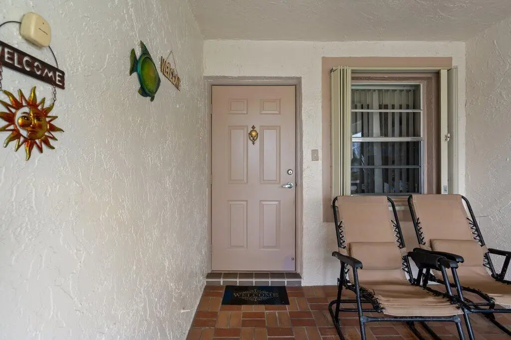 Front Exterior Patio.jpeg-SMALL at 3261 Anthony Circle, West Palm Beach