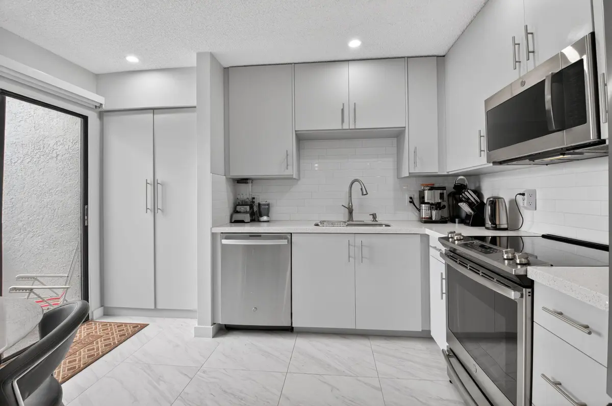 Spacious with sunlight from sliders at 7563 Glendevon Lane 1306, Delray Beach