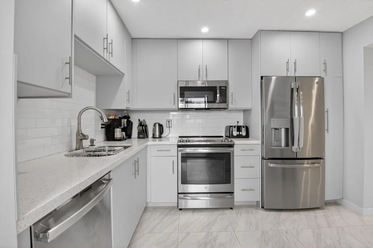 Updated kitchen at 7563 Glendevon Lane 1306, Delray Beach