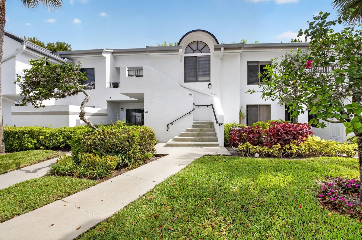 Private walkway from car at 7563 Glendevon Lane 1306, Delray Beach