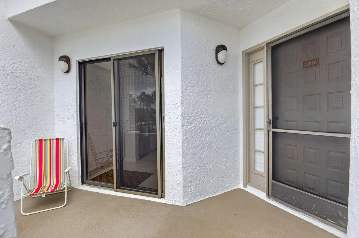 Front entrance and balcony at 7563 Glendevon Lane 1306, Delray Beach