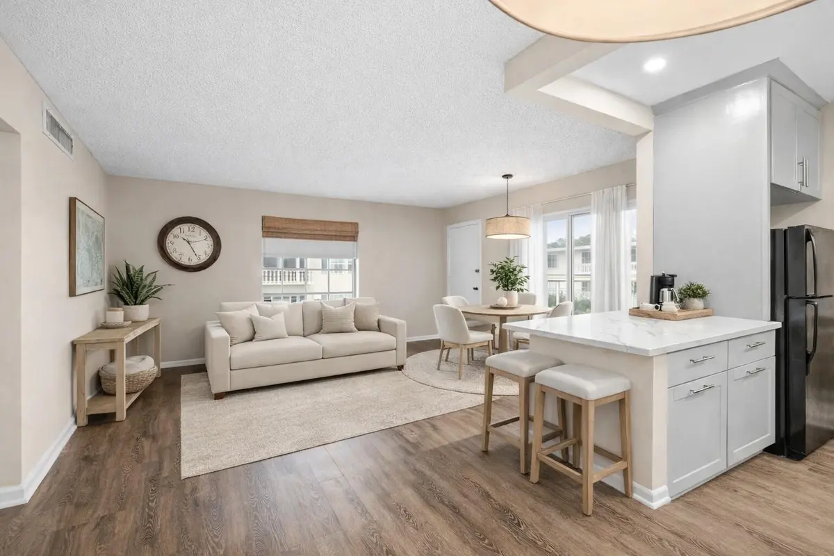 staged_with_couch at 2211 NE 67th Street 1131, Fort Lauderdale