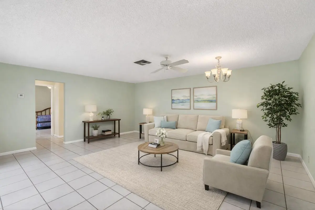 Spacious living room with soft hues at 801 NW 30th Avenue C, Delray Beach