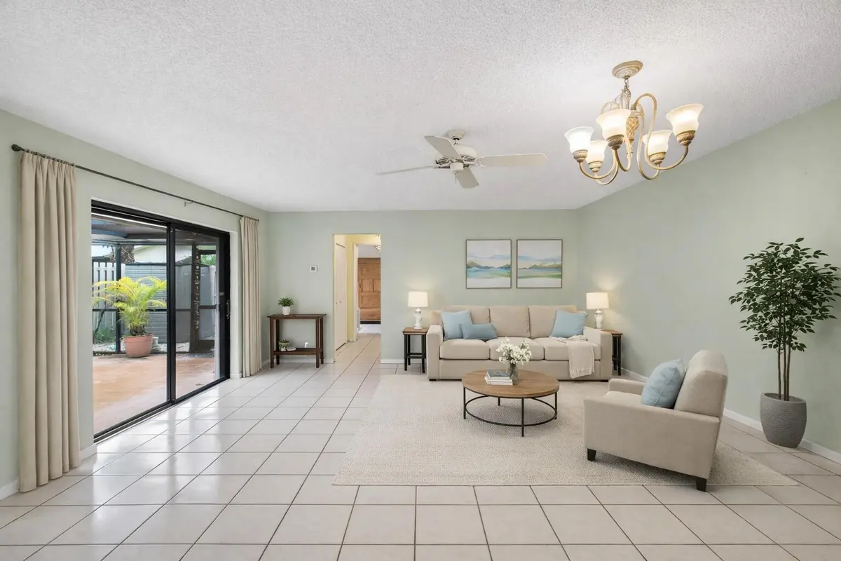 Spacious living room with serene accents at 801 NW 30th Avenue C, Delray Beach