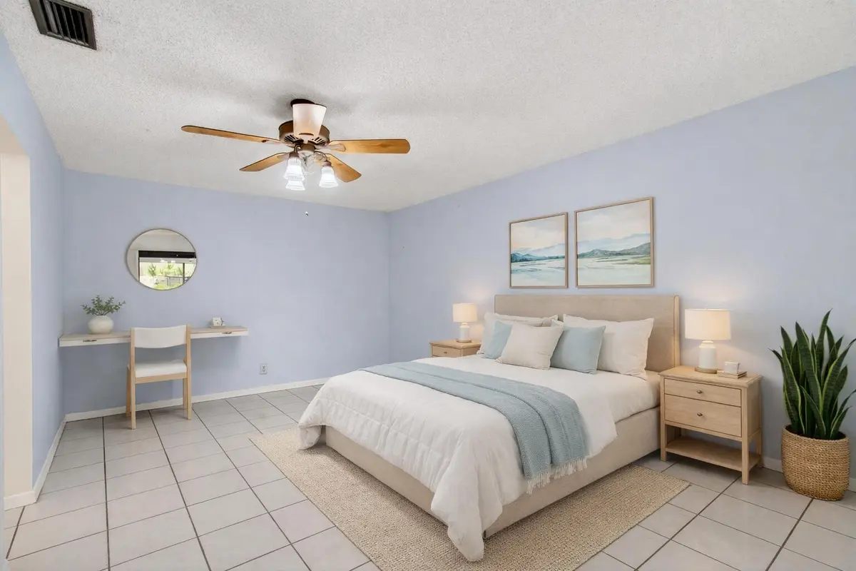 Serene guest bedroom with natural light at 801 NW 30th Avenue C, Delray Beach