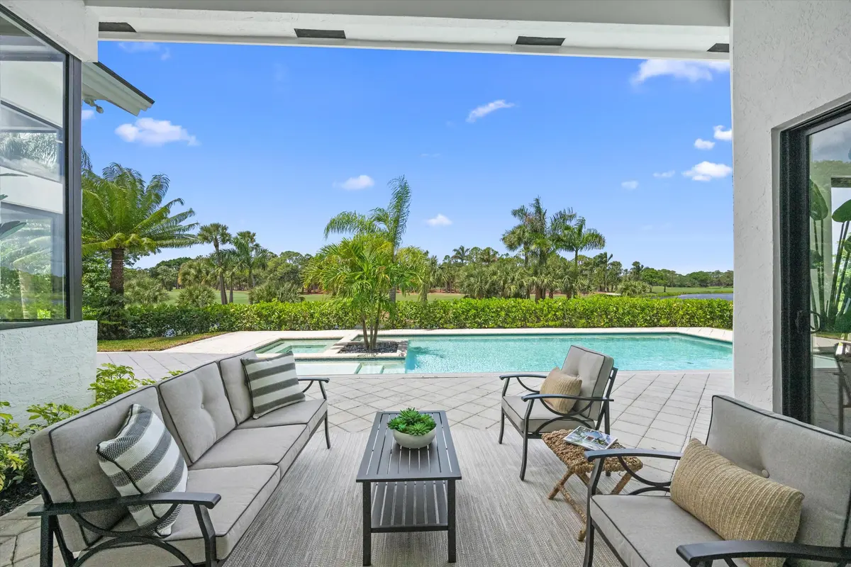 Patio opening off Living Room at 1330 Breakers West Boulevard, West Palm Beach