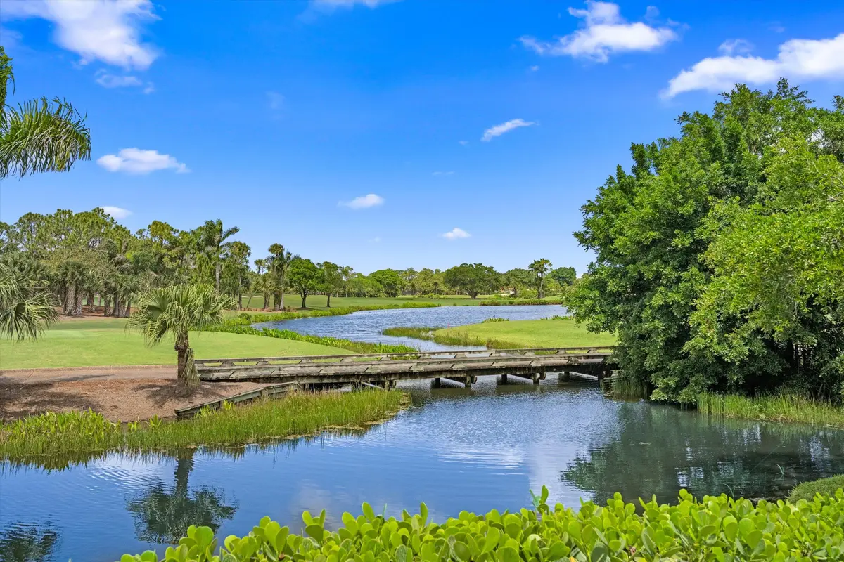 Endless water and golf course views at 1330 Breakers West Boulevard, West Palm Beach