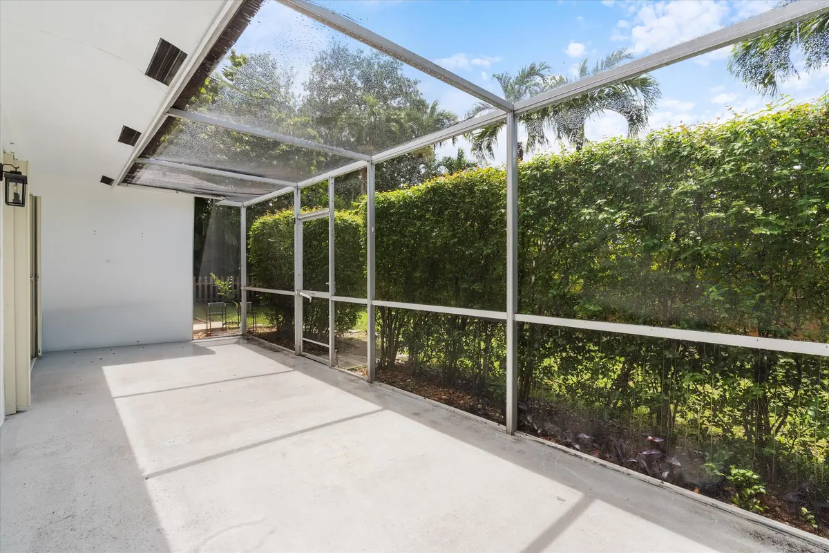Screened back patio area at 22707 SW 64th Way, Boca Raton