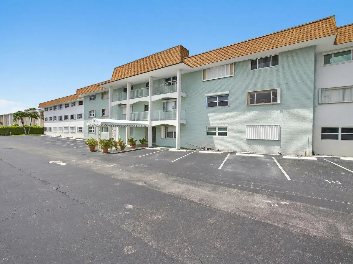 Building front elevation at 111 Shore Court #206, North Palm Beach