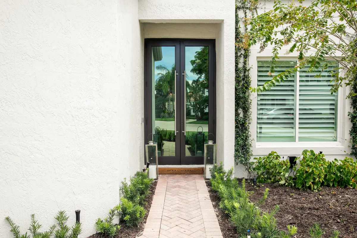10' TALL IMPACT ENTRY DOORS at 126 Sunset Cove Lane, Palm Beach Gardens