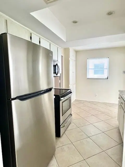STAINLESS FRIDGE, STOVE AND MICROHOOD at 907 SW 3rd Avenue, Boynton Beach