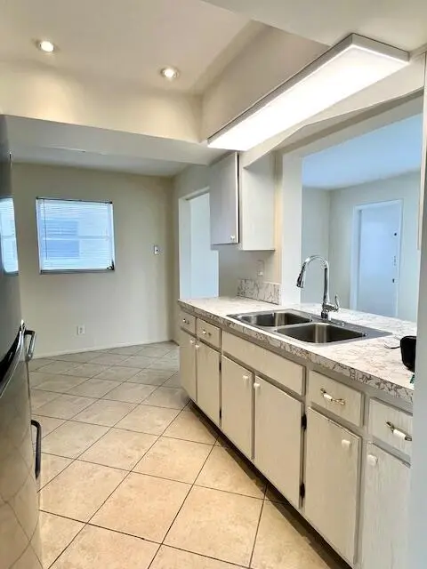 KITCHEN NEW LIGHT FIXTURE AND FAUCET at 907 SW 3rd Avenue, Boynton Beach