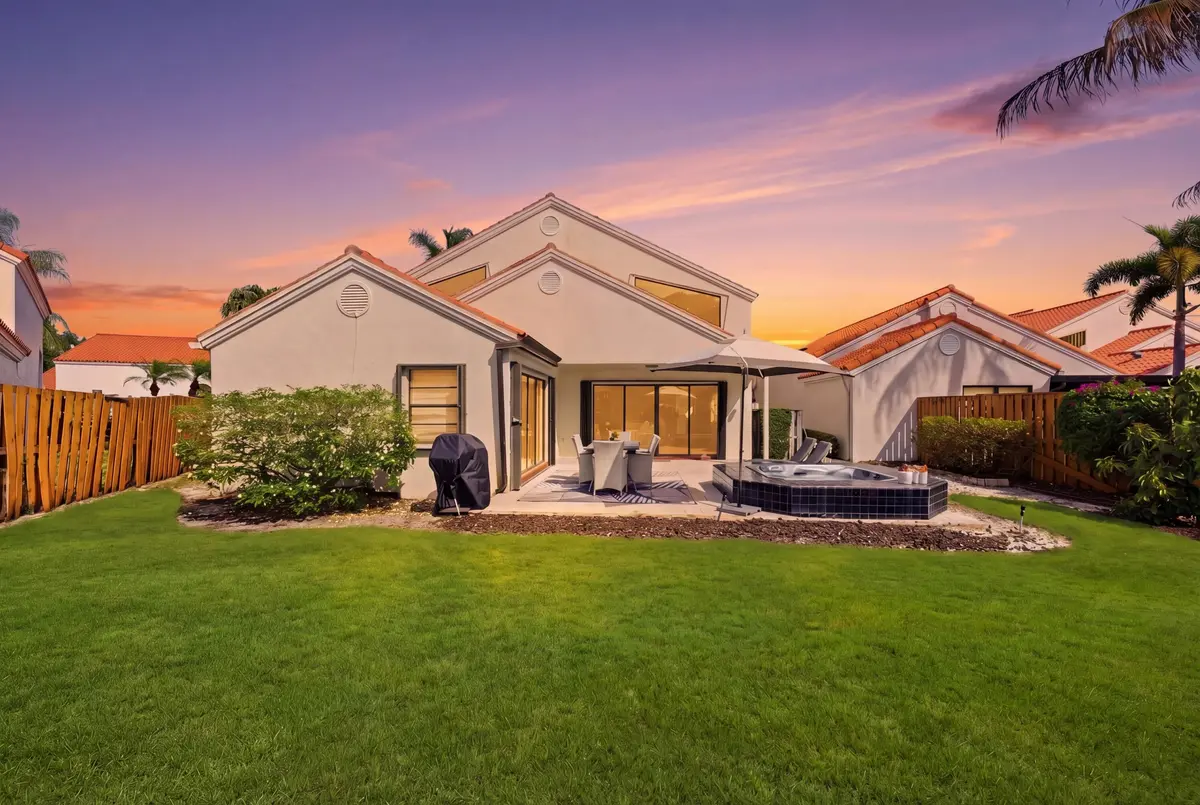 019__JJL6686_grass_8c619f3f_twilight_b78 at 2596 La Cristal Circle, Palm Beach Gardens