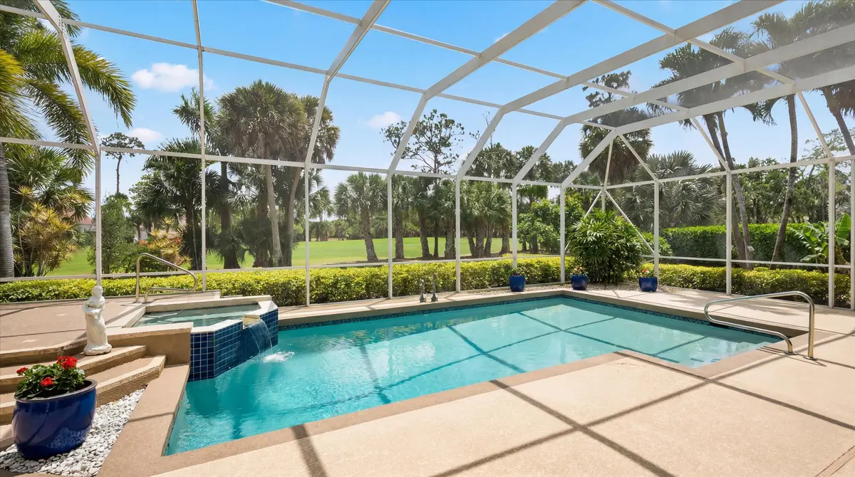 Screened heated pool/spa at 1776 Breakers West Boulevard, West Palm Beach