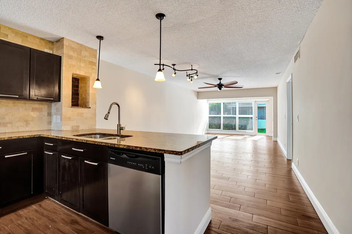 Kitchen to DA to LR at 1140 Boxwood Drive 102, Delray Beach
