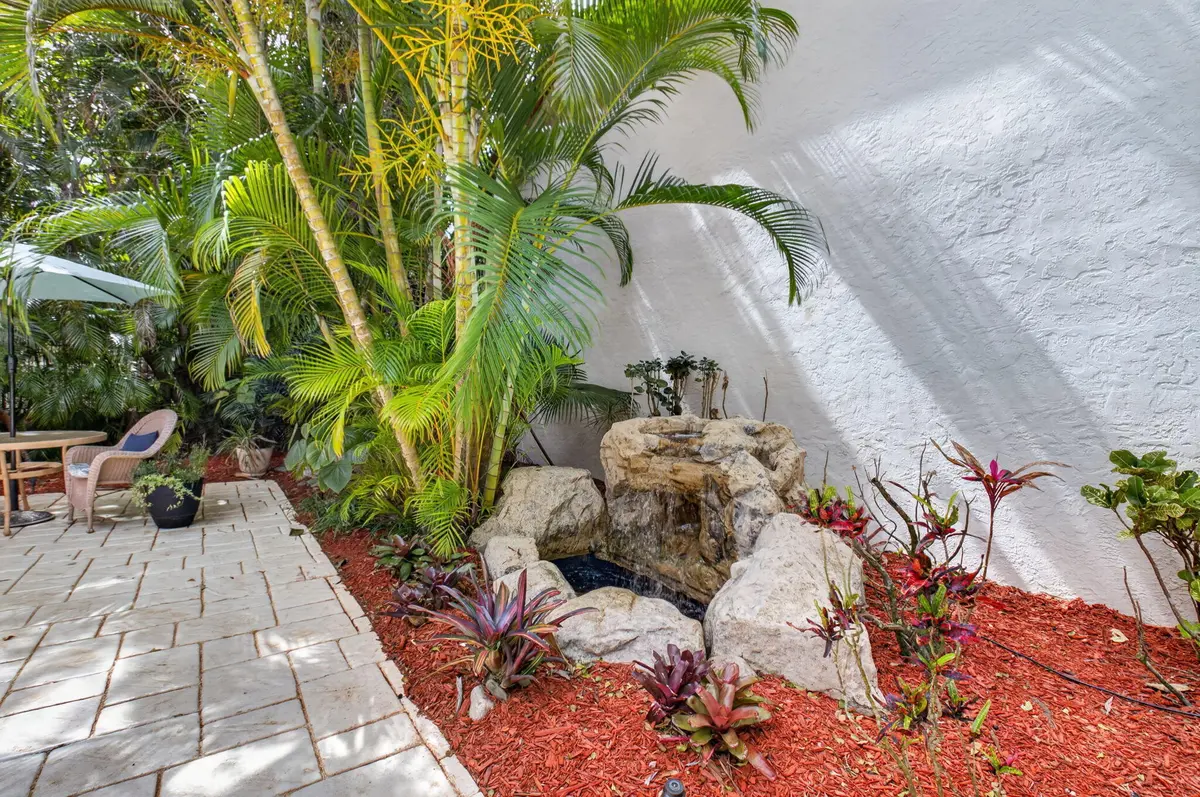 TRANQUIL ROCK WATERFALL at 21700 Club Villa Terrace, Boca Raton