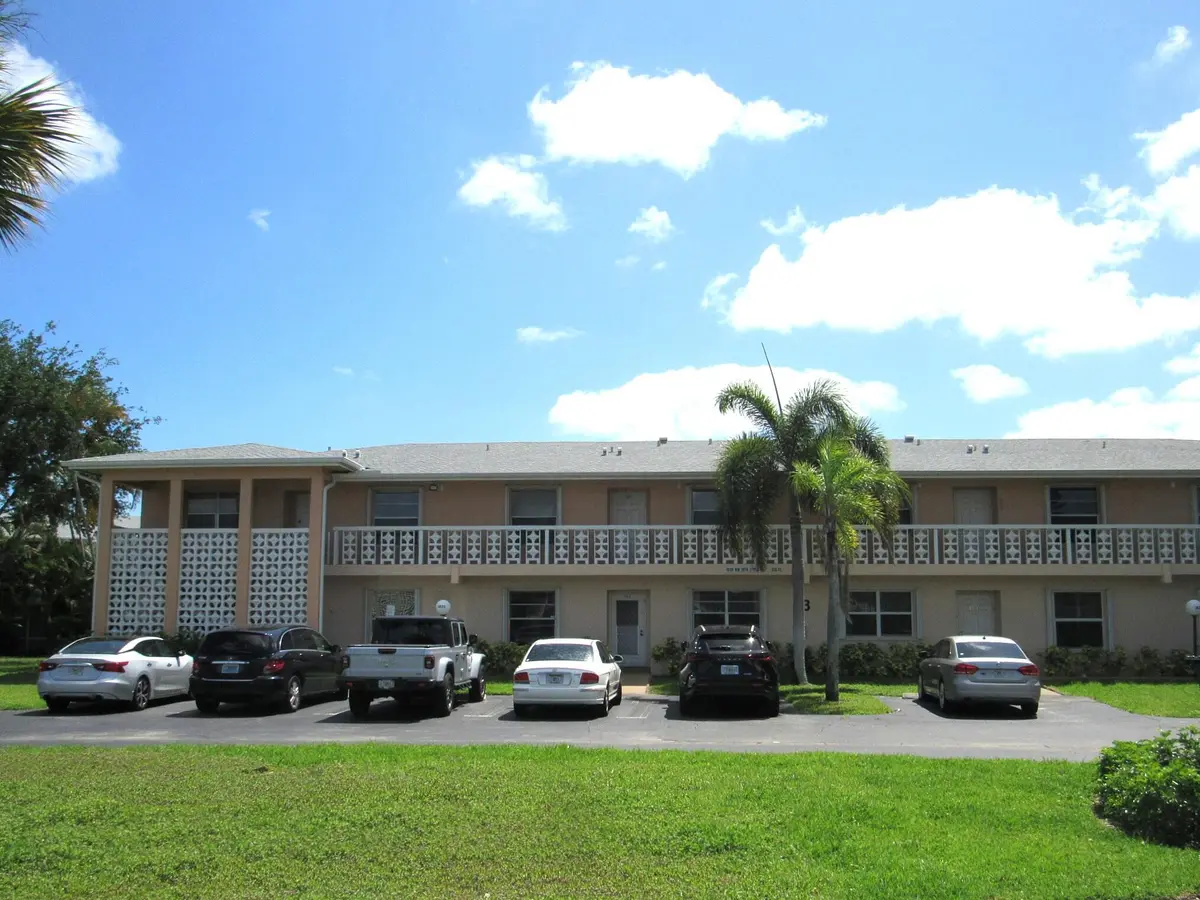 Many green areas w/in community at 1830 NW 18th Street 201, Delray Beach