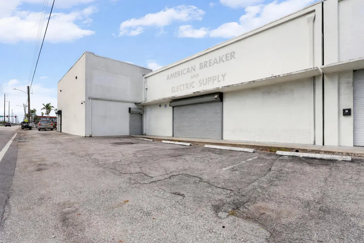 Faded industrial storefront on weathered at 1800 N Dixie Highway, Hollywood