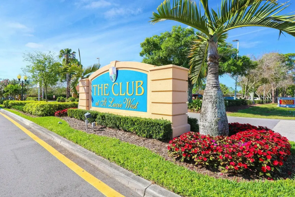 The Club entry sing at 121 SW Palm Drive Unit 306, Port St. Lucie