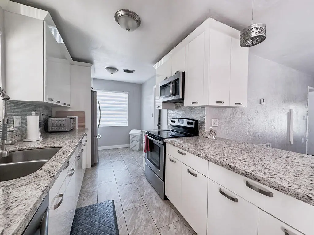 Photo 8 at 3621 NW 35th Way, Lauderdale Lakes