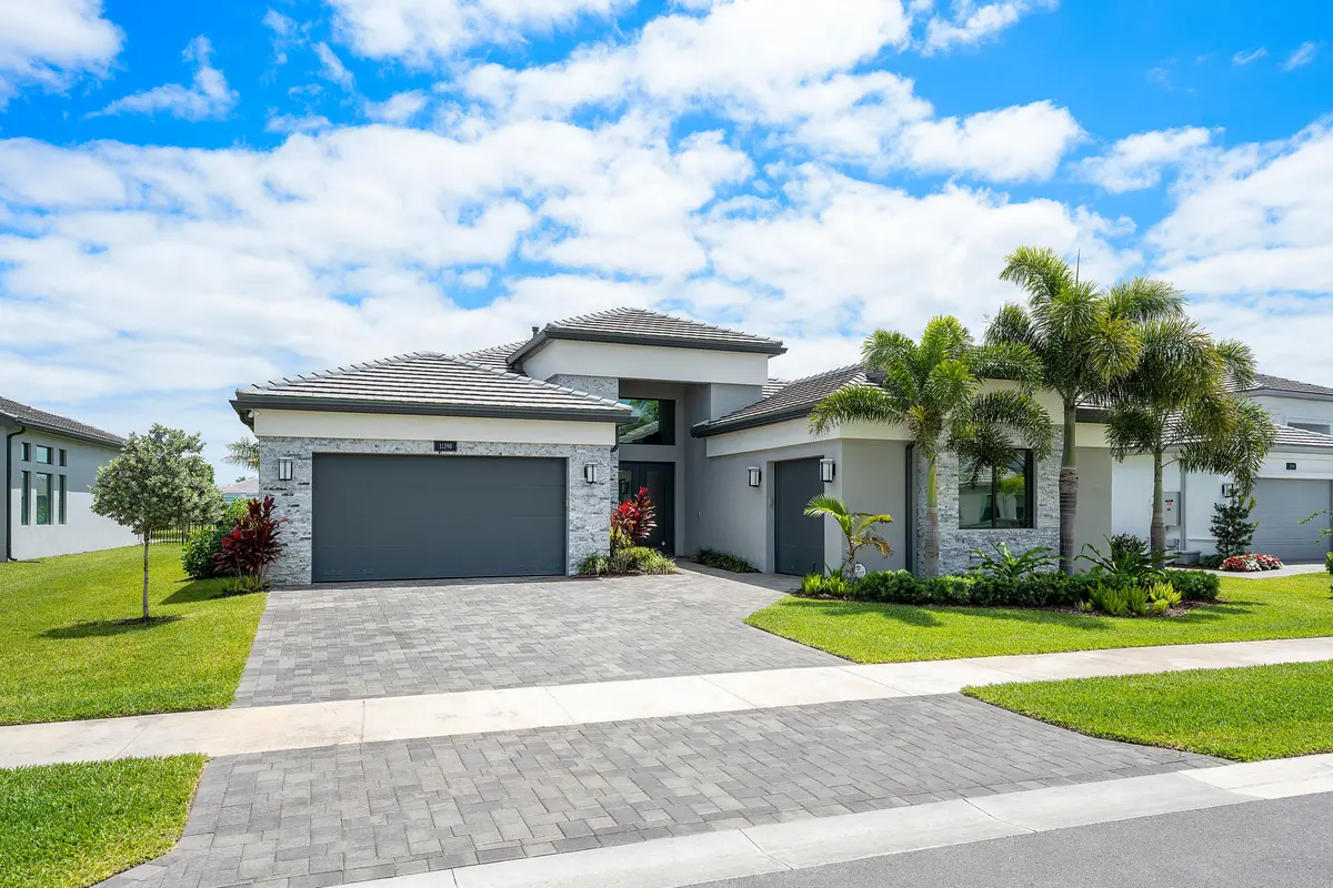 Lushly Landscaped Exterior at 11390 Cherry Canyon Court, Boynton Beach