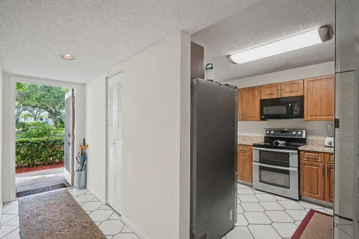 Entrance and Eat-In-Kitchen at 15244 Lakes Of Delray Boulevard 103, Delray Beach