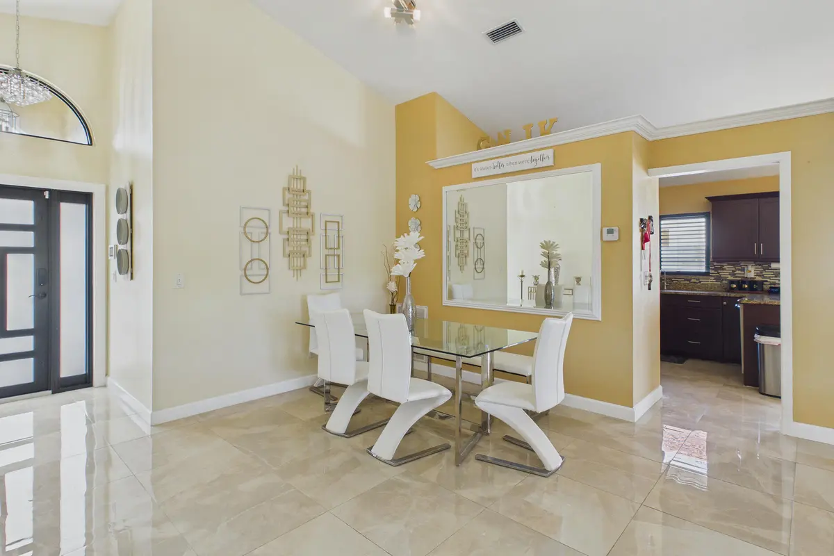 Dining Room off entrance at 169 Executive Circle, Boynton Beach