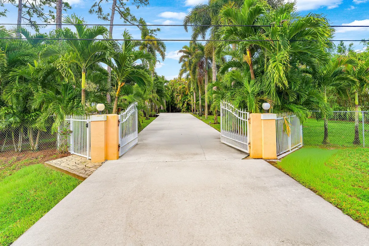 Front gate at 12328 85th Road, West Palm Beach