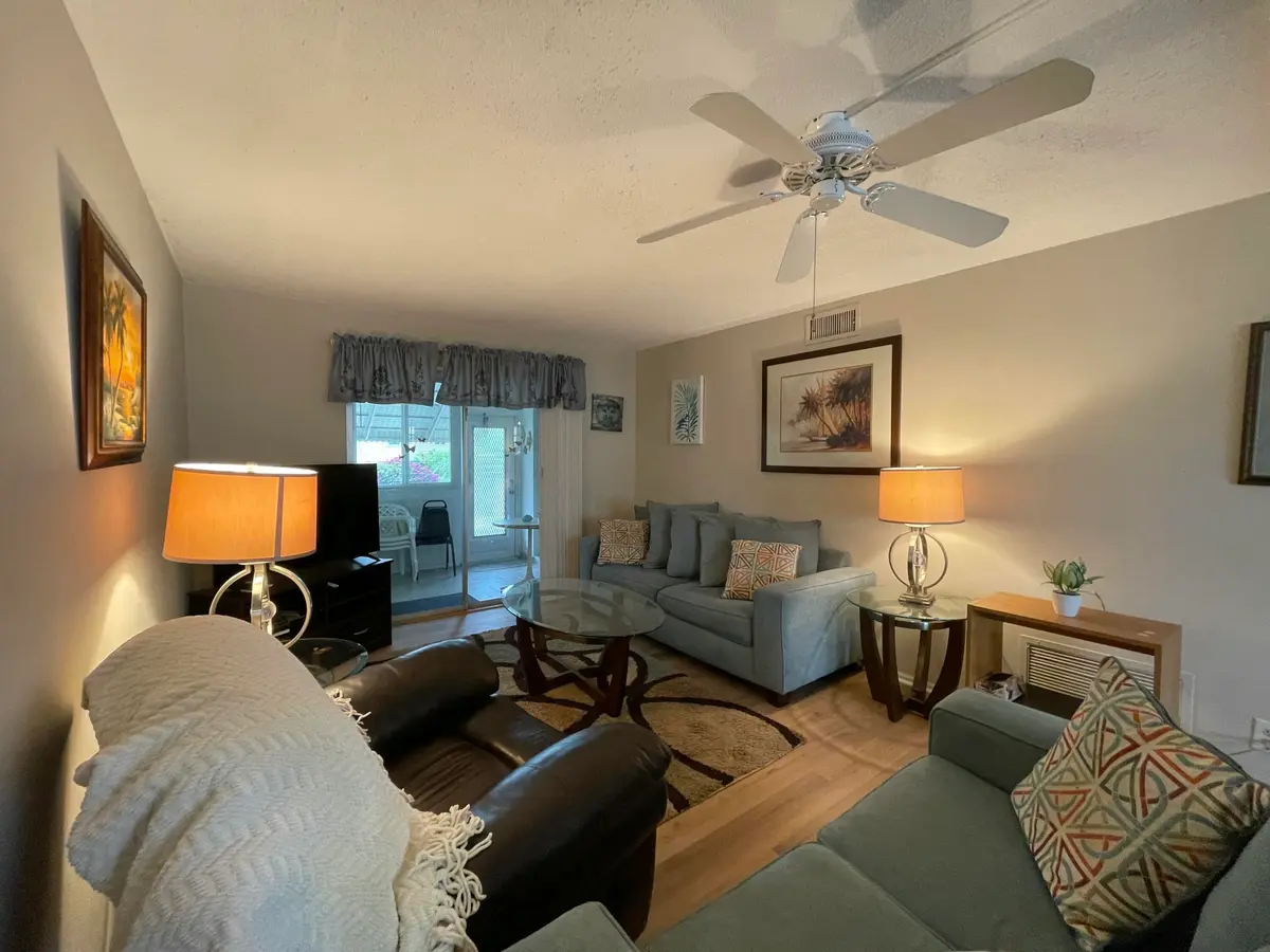 Living Room & Porch at 2152 NE 1st Way 102, Boynton Beach