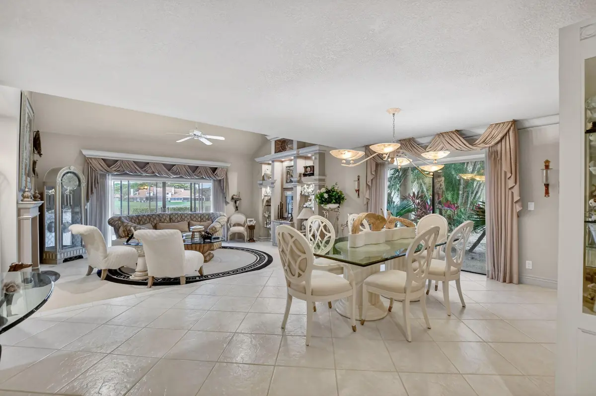 Living and dining areas at 22582 Meridiana Drive, Boca Raton