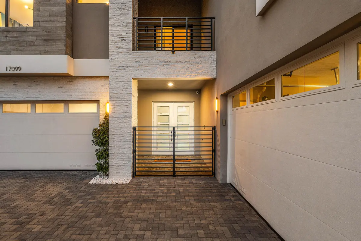Exterior Front Entry - Dusk at 17099 Watersprite Lakes Road, Boca Raton