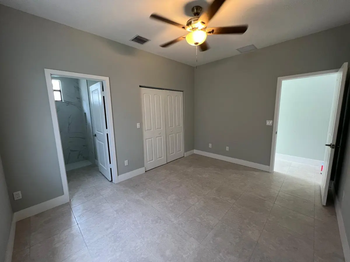 Master Bedroom w/ walk in closet at 227 N E Street, Lake Worth Beach