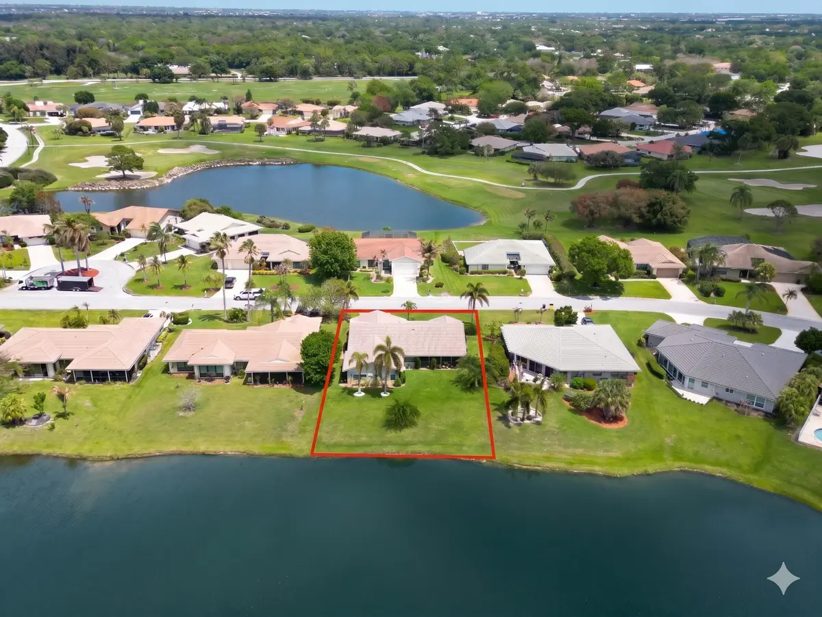 Back aerial with red lot lines at 2306 SW Creekside Drive, Palm City