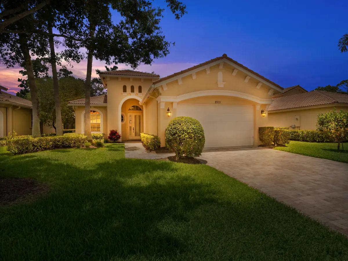 Front - Twilight at 8901 Champions Way, Port St. Lucie