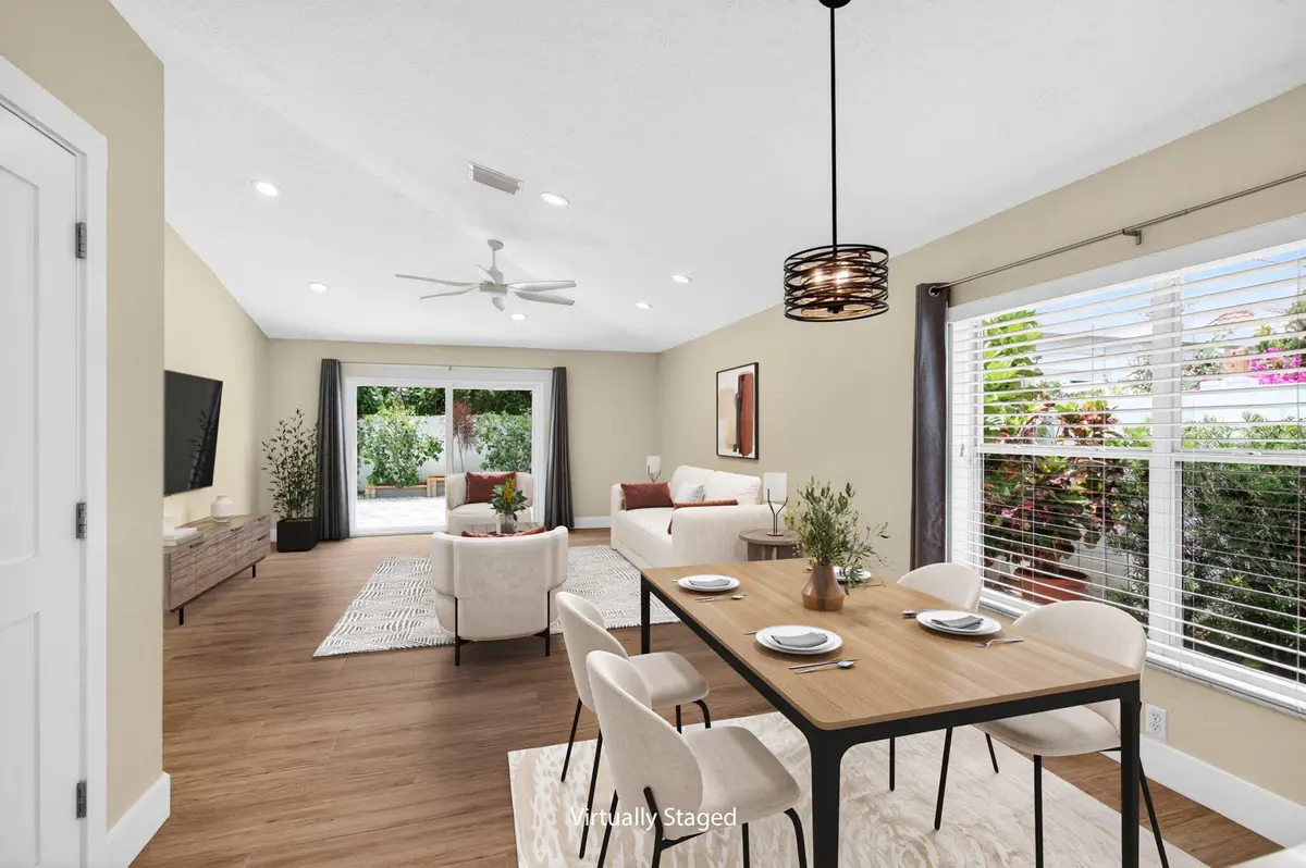 Informal living and dining at 1142 Canoe Point, Delray Beach