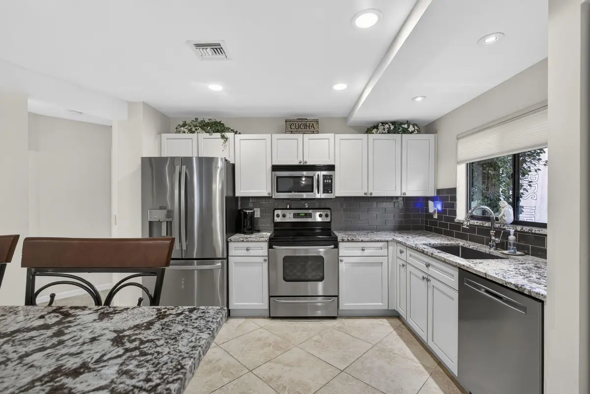 17-web-or-mls-BS1A8007 at 23 Lexington Lane B, Palm Beach Gardens