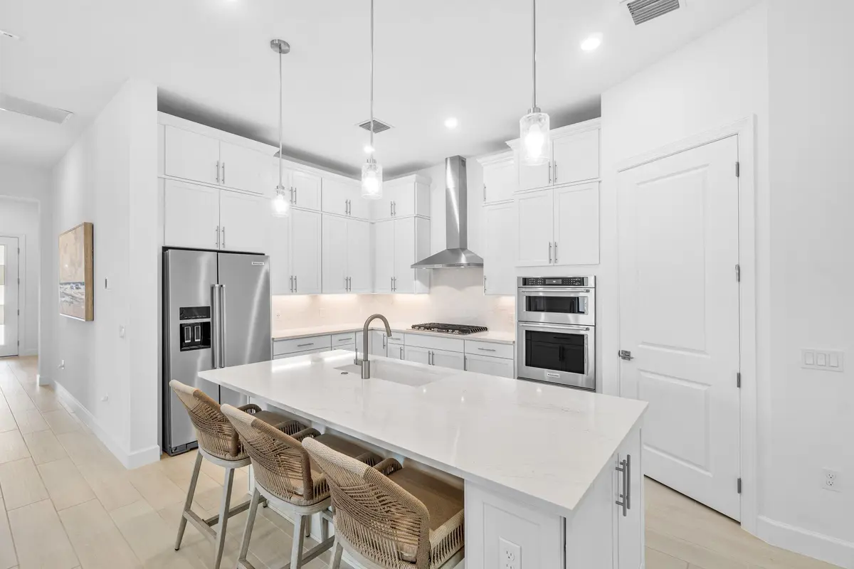 chef's kitchen at 9303 Cape Honey Bee Lane, Lake Worth