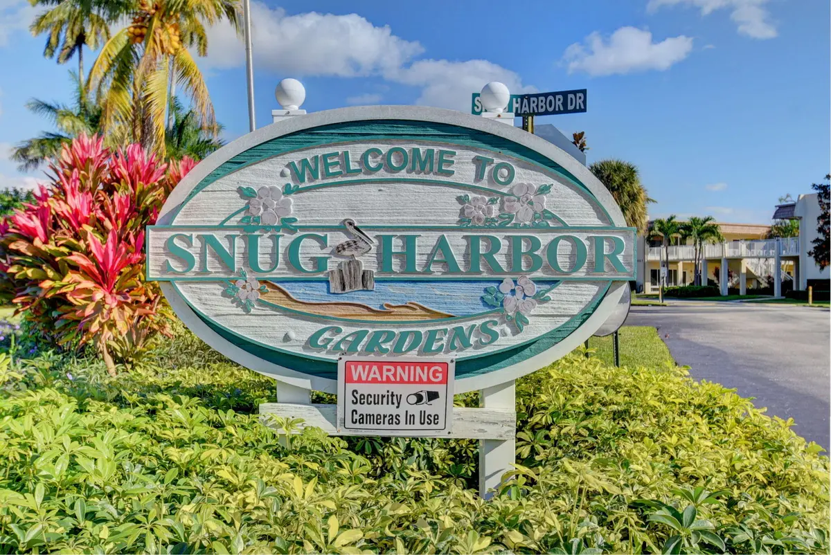 Snug Harbor Sign at 600 Snug Harbor Drive A16, Boynton Beach