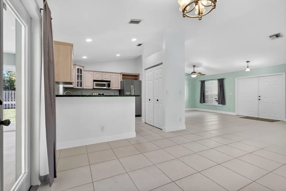Dining to Living Room at 780 Orchid Drive, Royal Palm Beach