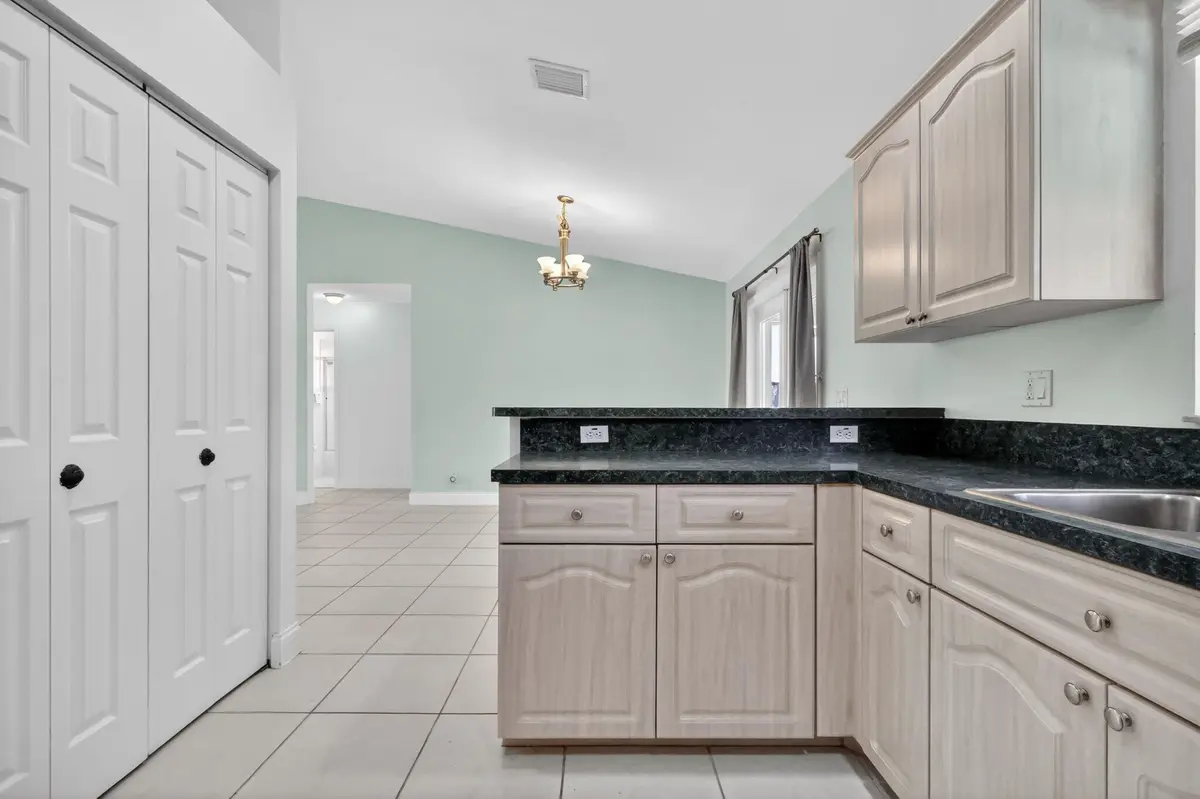 Kitchen & Pantry at 780 Orchid Drive, Royal Palm Beach